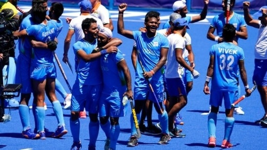 India players celebrate after defeating Germany 5-4 during the men's field hockey bronze medal match at the 2020 Summer Olympics, Thursday, Aug. 5, 2021, in Tokyo, Japan. (AP Photo/John Locher)(AP)