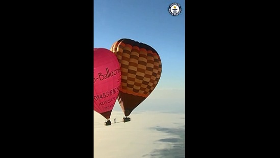 Man Walks Between Hot Air Balloons On A Beam At An Altitude Of Feet Watch Nail Biting
