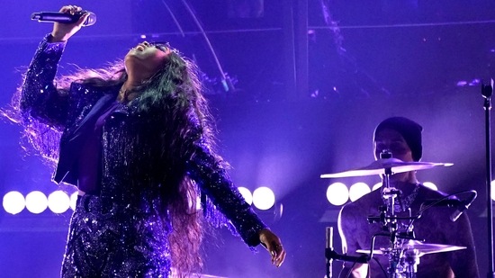 H.E.R. and Travis Barker performed We Made it at the Grammy Awards on Sunday. (Chris Pizzello/Invision/AP)
