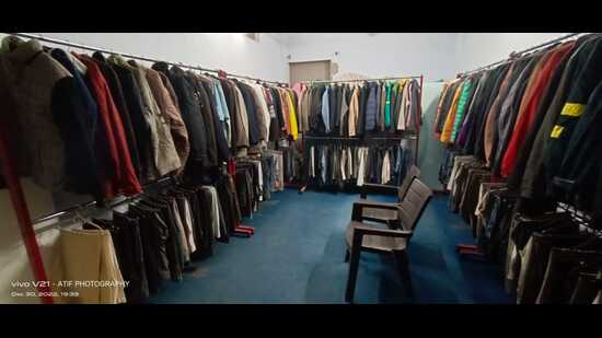 The stock of donated warm clothes collected and displayed at Adam’s Mall run by Islamic Centre of India. (HT Photo)