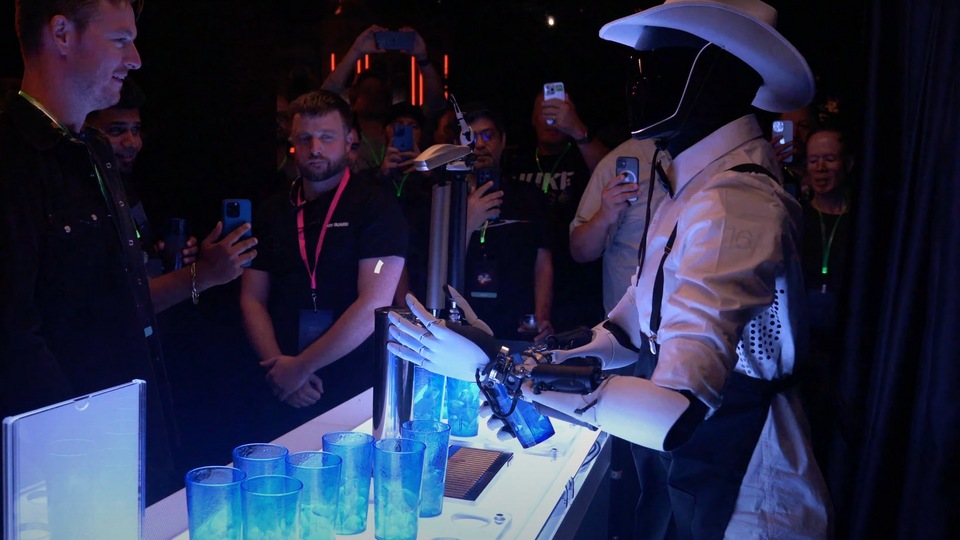 Elon Musks Optimus AI Robot Wows Guests By Serving Drinks To Cost