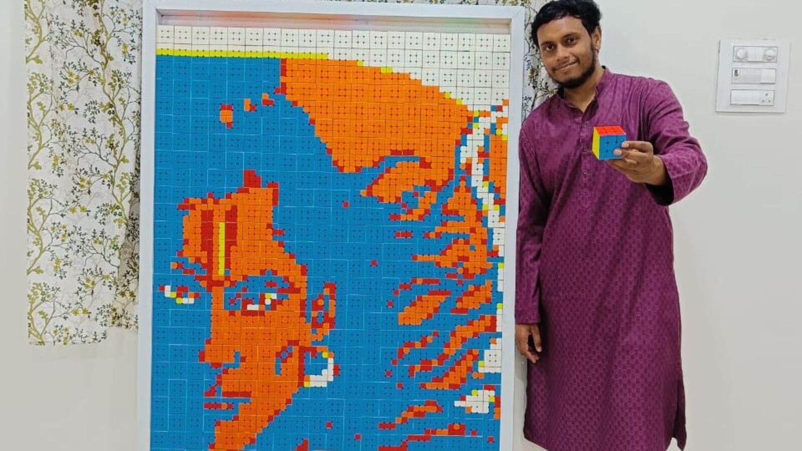 రూబిక్స్ క్యూబ్స్‌తో కళాఖండాలు.. గిన్నీస్ రికార్డు సాధిస్తానంటున్న యువకుడు