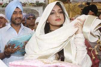 The star cast of upcoming Bollywood film Son of Sardar Ajay Devgn and Sonakshi Sinha at Harmandir Sahib in Amritsar on Wednesday. Munish Byala/HT