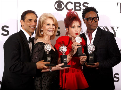 Producers Hal Luftig and Daryl Roth join Cyndi Lauper and Billy Porter as they pose with their awards for 'Kinky Boots' at the American Theatre Wing's annual Tony Awards in New York. The show was named Best Musical. (Reuters) 
</div)