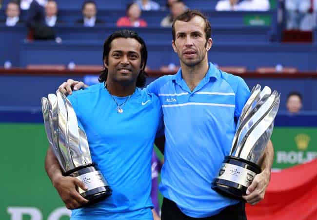 Leander Paes and Radek Stepanek pose with trophies after winning the men's doubles final. Reuters Leander Paes and Radek Stepanek pose with trophies after winning the men's doubles final. Reuters