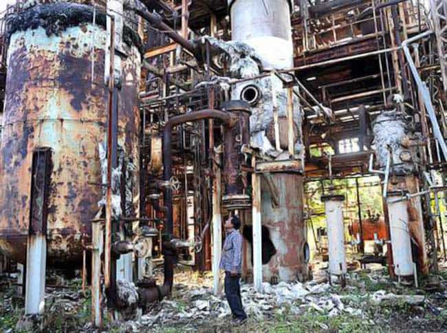 In this file photo, a man stands inside the abandoned Union Carbide Factory in Bhopal. (AFP) In this file photo, a man stands inside the abandoned Union Carbide Factory in Bhopal. (AFP)