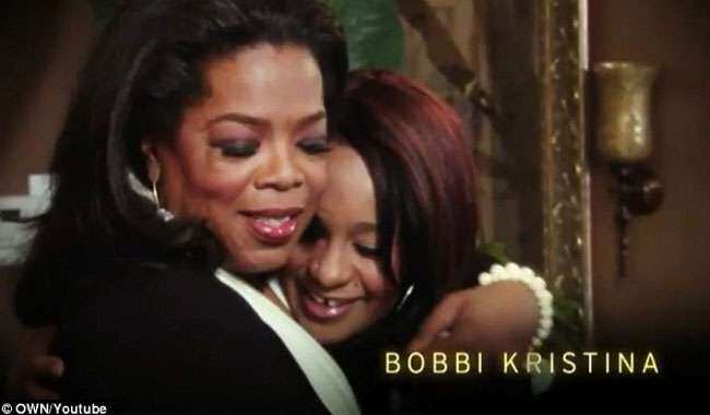 Oprah Winfrey (L) hugs Bobbi Kristina (R)
</div) Oprah Winfrey (L) hugs Bobbi Kristina (R)
</div)