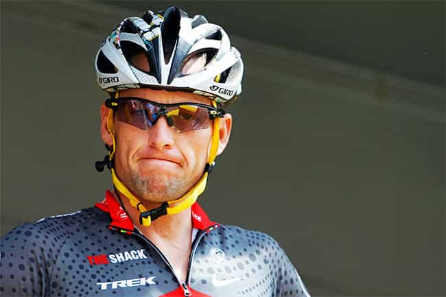 In this file photo, Lance Armstrong grimaces prior to the start of the third stage of the Tour de France cycling race in Wanze, Belgium. (AP Photo)
</div) In this file photo, Lance Armstrong grimaces prior to the start of the third stage of the Tour de France cycling race in Wanze, Belgium. (AP Photo)
</div)