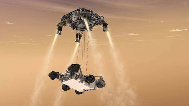 In this 2011 file artist's rendering, a "sky crane" lowers the Mars Science Laboratory Curiosity rover onto the surface of Mars. AP/Nasa/JPL-Caltech In this 2011 file artist's rendering, a "sky crane" lowers the Mars Science Laboratory Curiosity rover onto the surface of Mars. AP/Nasa/JPL-Caltech