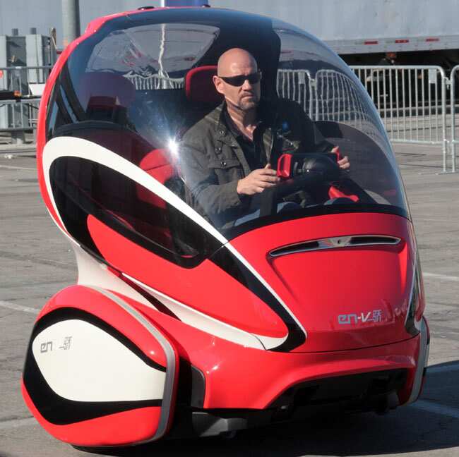 General Motors Electric Networked Vehicle (EN-V) concept represents a vision of the future of urban personal mobility, including a feature that would allow the vehicle to park itself and automatically return to the user when summoned from a smartphone application. REUTERS/Sam Abuelsamid/General Motors/Handout Who needs a license? Self-driving cars coming our way