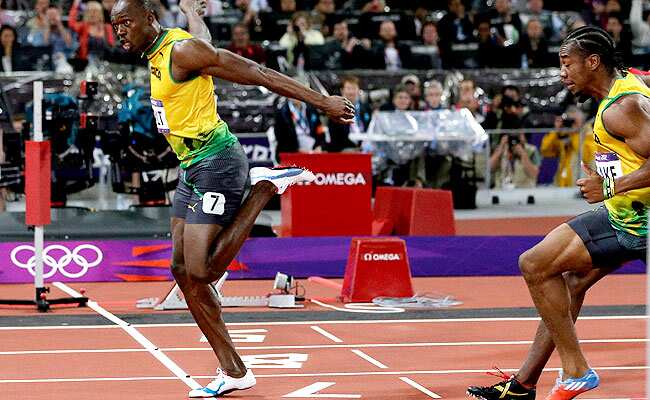 Jamaicas Usain Bolt crosses the finish line ahead of Jamaicas Yohan Blake to win gold in the mens 100-meter final during the athletics in the Olympic Stadium at the 2012 Summer Olympics, London. AP/David J Phillip Jamaicas Usain Bolt crosses the finish line ahead of Jamaicas Yohan Blake to win gold in the mens 100-meter final during the athletics in the Olympic Stadium at the 2012 Summer Olympics, London. AP/David J Phillip
