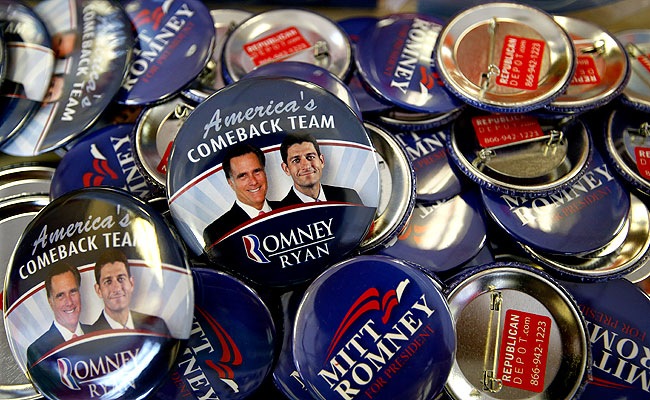 Romney along with his running mate Republican vice presidential candidate, Rep. Paul Ryan campaign buttons are displayed ahead of the Republican National Convention in Tampa, Florida. (AP Photo/Jae C. Hong)
</div) Romney along with his running mate Republican vice presidential candidate, Rep. Paul Ryan campaign buttons are displayed ahead of the Republican National Convention in Tampa, Florida. (AP Photo/Jae C. Hong)
</div)