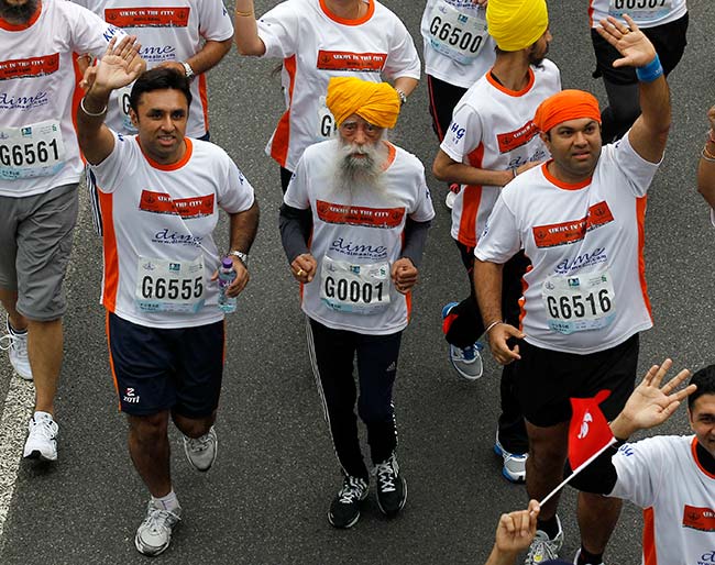 Fauja Singh Centenarian marathon runner Fauja Singh, 101, runs in a 10-kilometer race, held as part of the annual Hong Kong Marathon. (AP)
</div) Fauja Singh Centenarian marathon runner Fauja Singh, 101, runs in a 10-kilometer race, held as part of the annual Hong Kong Marathon. (AP)
</div)
