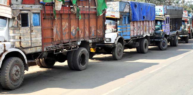 Tracks lined up at National Highway in Guwahati, during the two day nationwide strike called by central Trade Unions. Tracks lined up at National Highway in Guwahati, during the two day nationwide strike called by central Trade Unions.