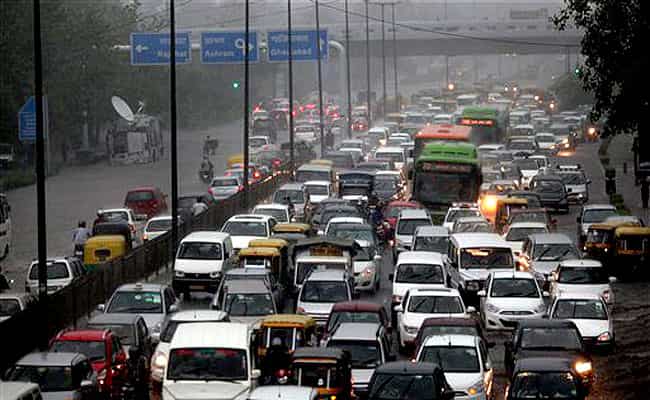 A car moves through a water logged street at Hero Honda Chowk on Delhi-Gurgaon Expressway after heavy rains in Gurgaon. Agencies A car moves through a water logged street at Hero Honda Chowk on Delhi-Gurgaon Expressway after heavy rains in Gurgaon. Agencies