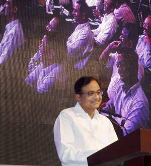 Finance minister P Chidambaram speaks to industrialists and businessmen at a programme at Ahmedabad. (PTI Photo)
</div) Finance minister P Chidambaram speaks to industrialists and businessmen at a programme at Ahmedabad. (PTI Photo)
</div)