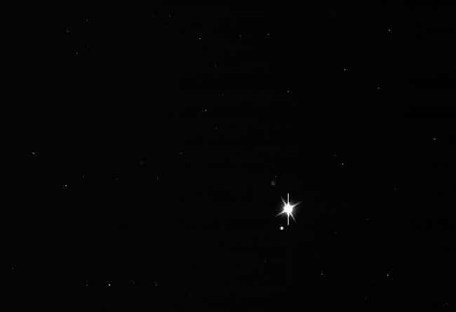 NASA image shows a raw image of the Earth-Moon system as captured by the Cassini mission orbiting Saturn in the outer solar system. (AFP photo)
</div) NASA image shows a raw image of the Earth-Moon system as captured by the Cassini mission orbiting Saturn in the outer solar system. (AFP photo)
</div)