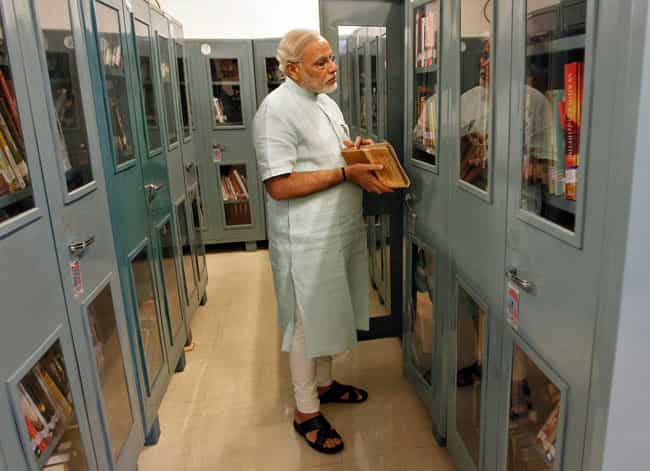 Gujarat CM Narendra Modi in a library inside his residence at Gandhinagar, Gujarat. (Reuters file photo) Gujarat CM Narendra Modi in a library inside his residence at Gandhinagar, Gujarat. (Reuters file photo)