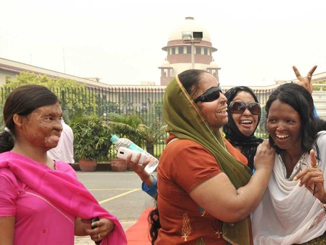 Laxmi (R) with other acid attack victims at the Supreme Court after hearing on a plea filed by her on the regulation of sale of the chemicals at the retail level in New Delhi. (Mohd Zakir/Hindustan Times) Laxmi (R) with other acid attack victims at the Supreme Court after hearing on a plea filed by her on the regulation of sale of the chemicals at the retail level in New Delhi. (Mohd Zakir/Hindustan Times)