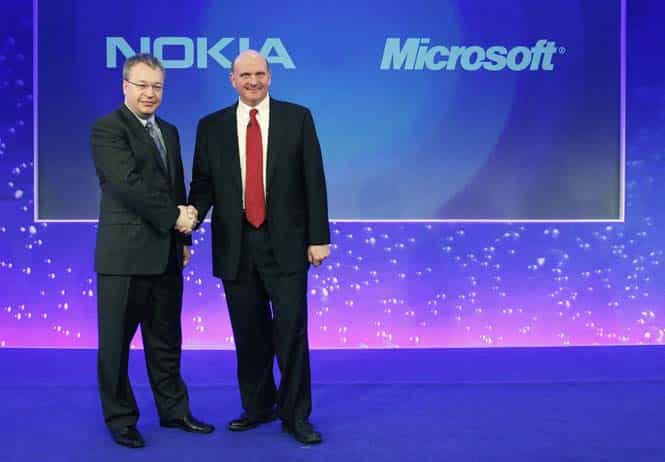 File photo of Nokia chief executive Stephen Elop (L) welcomes Microsoft chief executive Steve Ballmer with a handshake at a Nokia event in London. (Reuters) File photo of Nokia chief executive Stephen Elop (L) welcomes Microsoft chief executive Steve Ballmer with a handshake at a Nokia event in London. (Reuters)