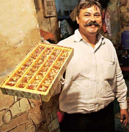 A date with taste: Ram Sharan with a box of khajoor lauz A date with taste: Ram Sharan with a box of khajoor lauz