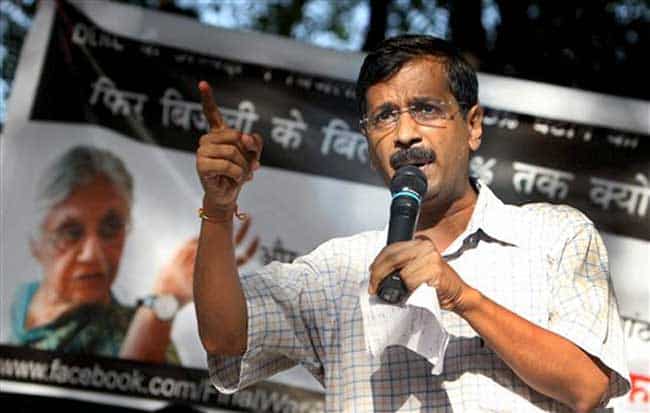 India Against Corruption activist Arvind Kejriwal addressing his supporters during a protest against hike in power tariffs, in New Delhi. PTI Photo India Against Corruption activist Arvind Kejriwal addressing his supporters during a protest against hike in power tariffs, in New Delhi. PTI Photo