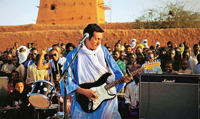 Desert Storm: Bombino, the 32-year-old musician from Niger, spreads his message of peace Desert Storm: Bombino, the 32-year-old musician from Niger, spreads his message of peace