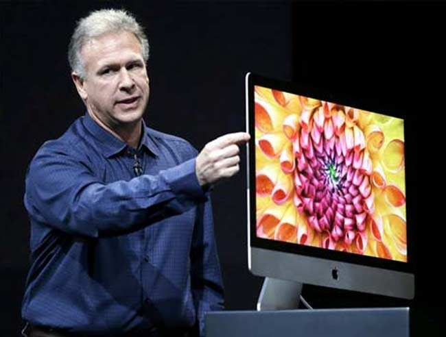 Phil Schiller, Apple's senior vice president of worldwide product marketing, talks about the thinness of the new iMac in San Jose, California. AP Photo Phil Schiller, Apple's senior vice president of worldwide product marketing, talks about the thinness of the new iMac in San Jose, California. AP Photo