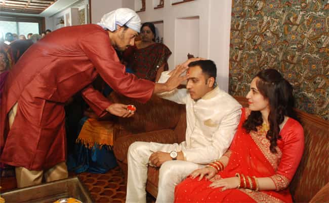 The tikka is one of the few moments in a wedding where only the brother's presence is required. Use for his strength, cunning and patience come much later.