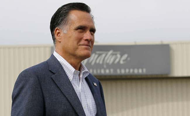 Republican Presidential candidate Mitt Romney walks to his campaign plane in Denver, Colorado. Reuters/Brian Snyder