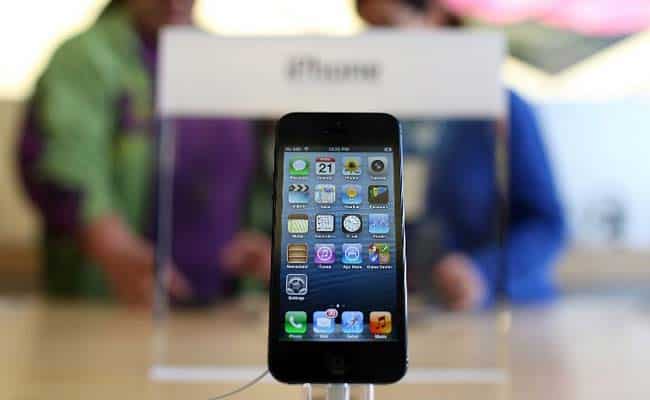 A new iPhone 5 is displayed at an Apple Store in San Francisco, California. Customers flocked to Apple Stores across the US to purchase the hotly anticipated iPhone 5. AFP/Justin Sullivan