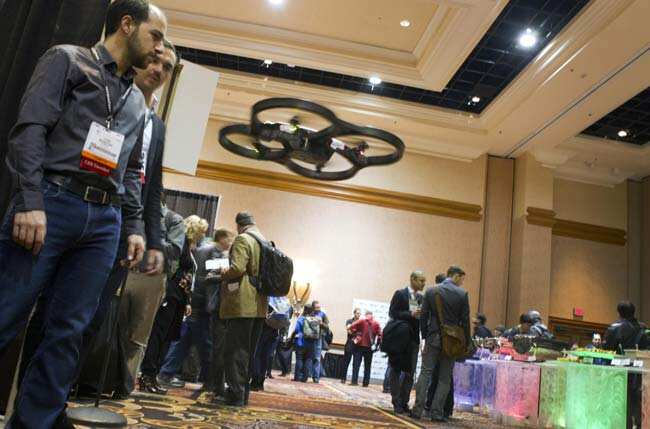 A Parrot AR. Drone with video camera flies on autopilot at the opening press event of the Consumer Electronics Show (CES) in Las Vegas January 6, 2013. New movie-making software features are coming this year for the $299.00 quadricopter , a representative said. Reuters/Steve Marcu) A Parrot AR. Drone with video camera flies on autopilot at the opening press event of the Consumer Electronics Show (CES) in Las Vegas January 6, 2013. New movie-making software features are coming this year for the $299.00 quadricopter , a representative said. Reuters/Steve Marcu)