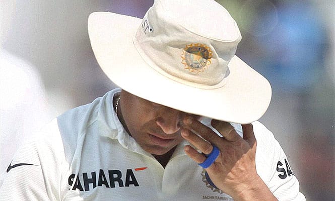 An emotional Sachin Tendulkar walks off the Wankhede pitch after he bid adieu to competitive cricket as India beat West Indies in Mumbai. (PTI Photo) An emotional Sachin Tendulkar walks off the Wankhede pitch after he bid adieu to competitive cricket as India beat West Indies in Mumbai. (PTI Photo)