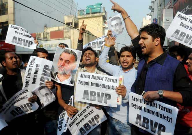 ABVP activists shout slogans as they protest against Tarun Tejpal outside Tehelka's office in New Delhi. (PTI Photo)
</div) ABVP activists shout slogans as they protest against Tarun Tejpal outside Tehelka's office in New Delhi. (PTI Photo)
</div)