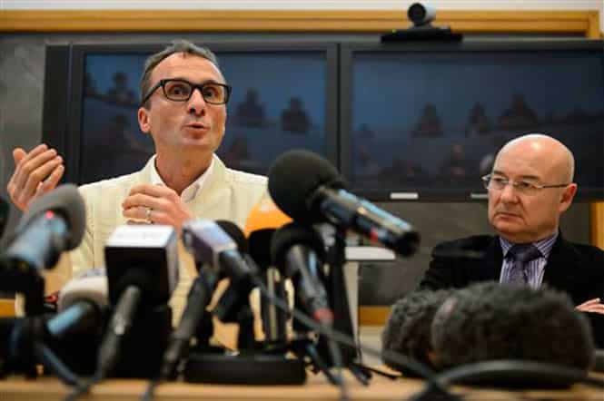 Swiss professor Francois Bochud, left, director of the Chuv Radiophysics Institute, IRA, and Swiss professor Patrice Mangin, right, director of the University Center of Legal Medicine in Lausanne, CURML, speak on a forensics report concerning the late President Yasser Arafat during a press conference at the Centre Hospitalier Universitaire Vaudois, CHUV, in Lausanne, Switzerland. (AP Photo) 
</div)