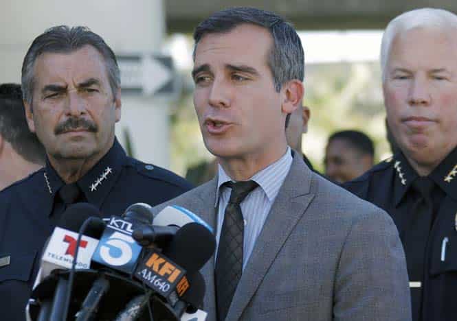 Los Angeles Police chief Charlie Beck (L) joins Los Angeles mayor Eric Garcetti (C) during a news conference at Los Angeles International Airport after a gunman armed with a semi-automatic rifle opened fire at Los Angeles International Airport. (AP Photo) Los Angeles Police chief Charlie Beck (L) joins Los Angeles mayor Eric Garcetti (C) during a news conference at Los Angeles International Airport after a gunman armed with a semi-automatic rifle opened fire at Los Angeles International Airport. (AP Photo)