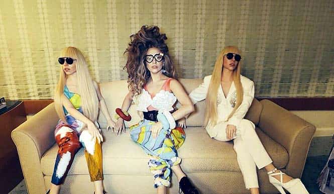 Lady Gaga (centre) flanked by the doppelganger dolls)