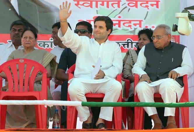 Congress vice president Rahul Gandhi with senior leaders Motilal Vohra and Mohsina Kidwai at an election rally in Rajnandgaon district, Chhattisgarh. (PTI Photo) 
</div)