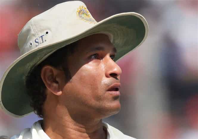 An emotional Sachin Tendulkar walks out of the ground after India beat West Indies at Wankhede in Mumbai. (PTI Photo)
</div) An emotional Sachin Tendulkar walks out of the ground after India beat West Indies at Wankhede in Mumbai. (PTI Photo)
</div)