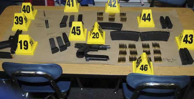 The complete arsenal used by Adam Landa, on display (AP Photo)