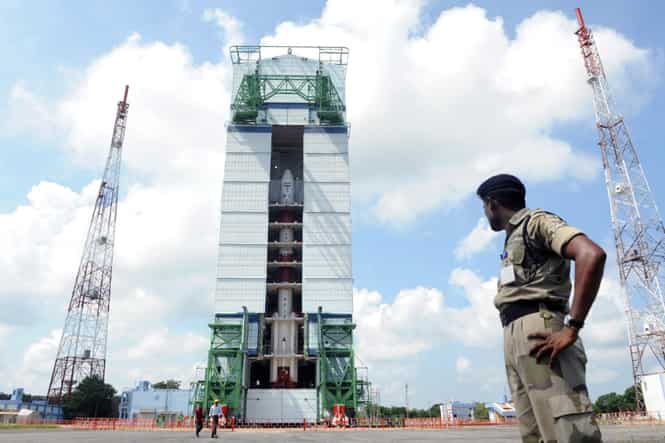 CISF personnel stand guard near the PSLV-C25 at the Satish Dhawan Space Center at Sriharikota. (AP photo)</em) CISF personnel stand guard near the PSLV-C25 at the Satish Dhawan Space Center at Sriharikota. (AP photo)</em)