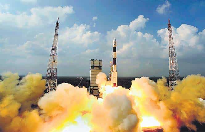 PSLV-C25 rocket carrying the Mars Orbiter blasting off at Sriharikota on October 31. (AFP Photo)</strong) PSLV-C25 rocket carrying the Mars Orbiter blasting off at Sriharikota on October 31. (AFP Photo)</strong)