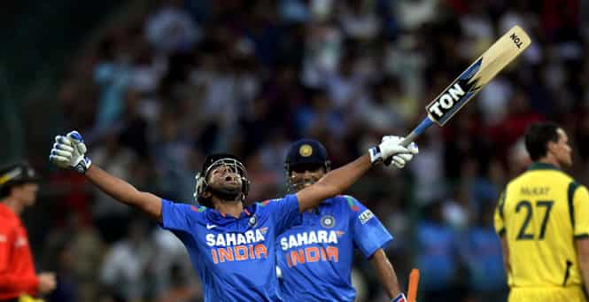 Batsman Rohit Sharma celebrates his double ton against Australia during the final ODI cricket match at M Chinnaswami Stadium in Bangalore. (Mohd Zakir/HT) 
</div)