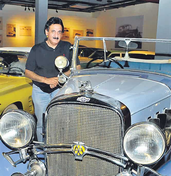 Tarun Thakral poses with a vintage beauty at the Heritage Transport Museum. (Parveen Kumar/ HT Photo)</em></strong) Tarun Thakral poses with a vintage beauty at the Heritage Transport Museum. (Parveen Kumar/ HT Photo)</em></strong)