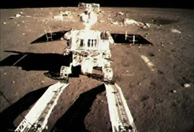 This image taken from video, shows China's first moon rover touching the lunar surface and leaving deep traces on its loose soil. (AP Photo)
</div) This image taken from video, shows China's first moon rover touching the lunar surface and leaving deep traces on its loose soil. (AP Photo)
</div)