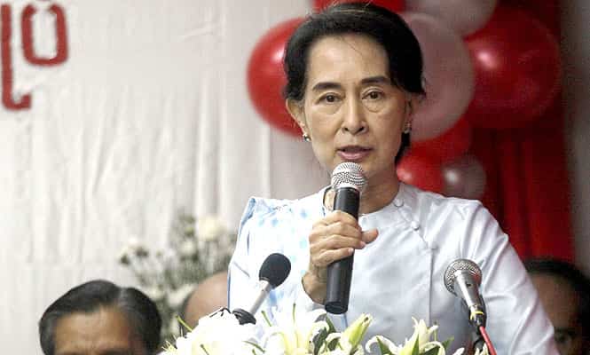 Myanmar Opposition Leader Aung San Suu Kyi delivers a speech during a ceremony at her party headquarters in Yangon, Myanmar. (AP Photo)
</div) Myanmar Opposition Leader Aung San Suu Kyi delivers a speech during a ceremony at her party headquarters in Yangon, Myanmar. (AP Photo)
</div)