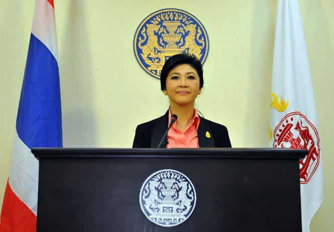 DIV class=photo_disc Thai Prime Minister Yingluck Shinawatra speaks at the police headquarter in Bangkok. (AFP photo) 
<div></div)