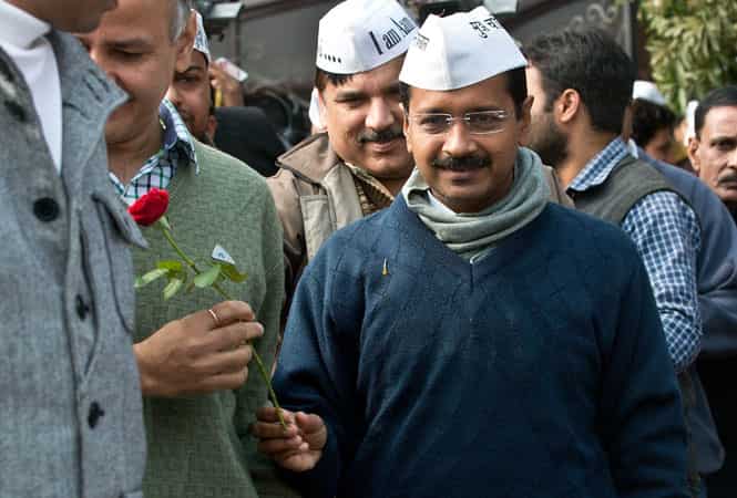 AAP leader Arvind Kejriwal arrives to address a press conference at the party headquarters in Ghaziabad. (AFP photo)</em)