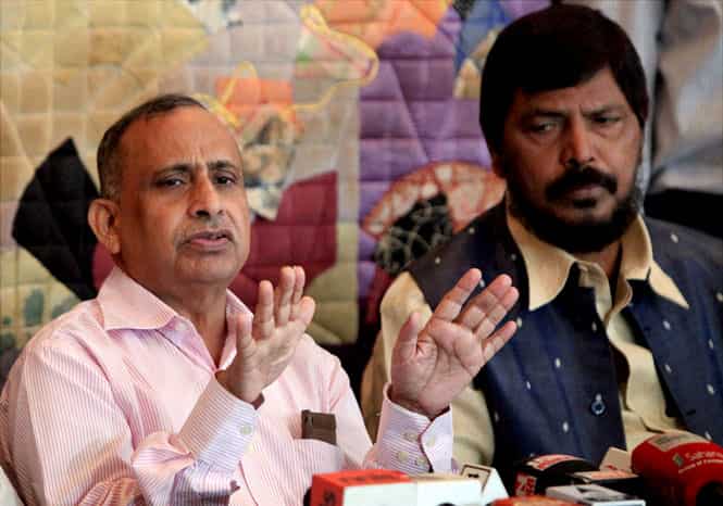Indian diplomat Devyani Khobragade's father Uttam Khobragade with RPI chief Ramdas Athavale during a press conference in Mumbai. (PTI photo) Indian diplomat Devyani Khobragade's father Uttam Khobragade with RPI chief Ramdas Athavale during a press conference in Mumbai. (PTI photo)