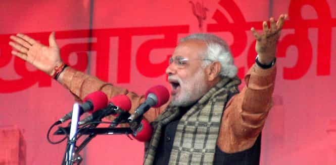 BJP PM candidate Narendra Modi addresses an election campaign rally in Varanasi. (PTI photo)</em) BJP PM candidate Narendra Modi addresses an election campaign rally in Varanasi. (PTI photo)</em)